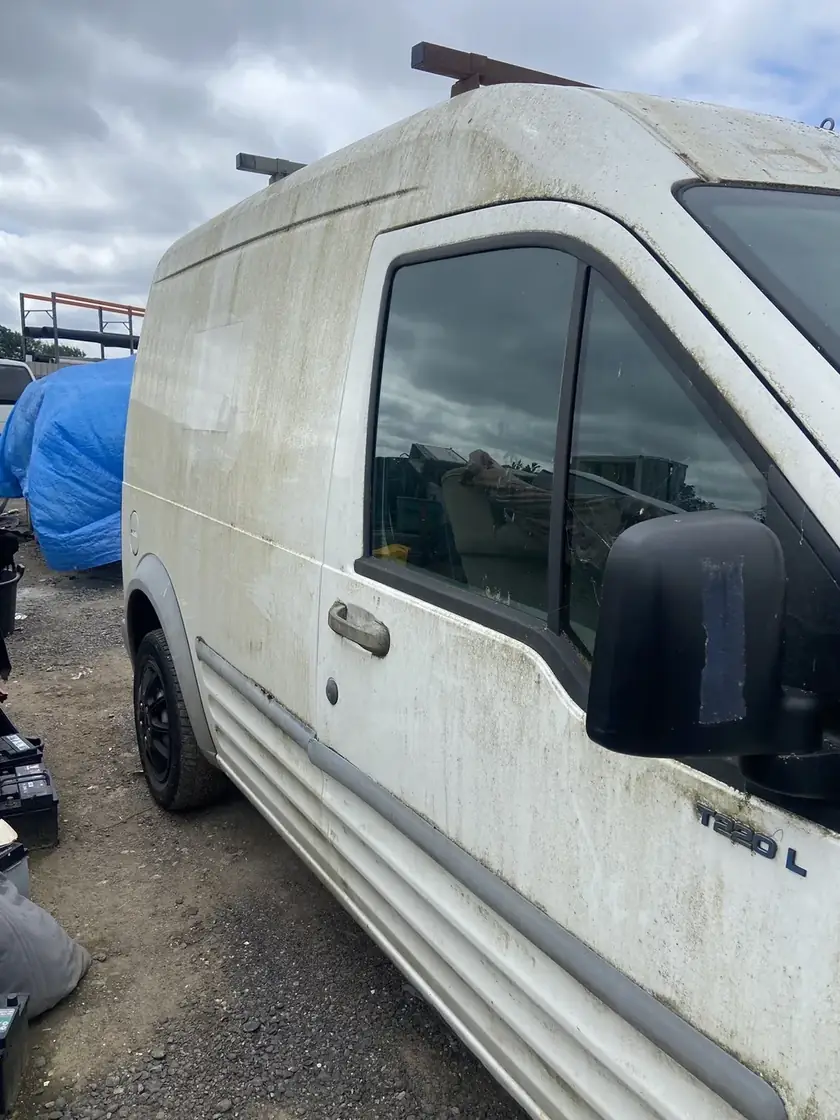 White van before exterior cleaning